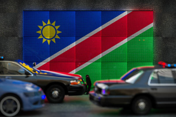 Bright digital display Namibia flag in city as cars drive past